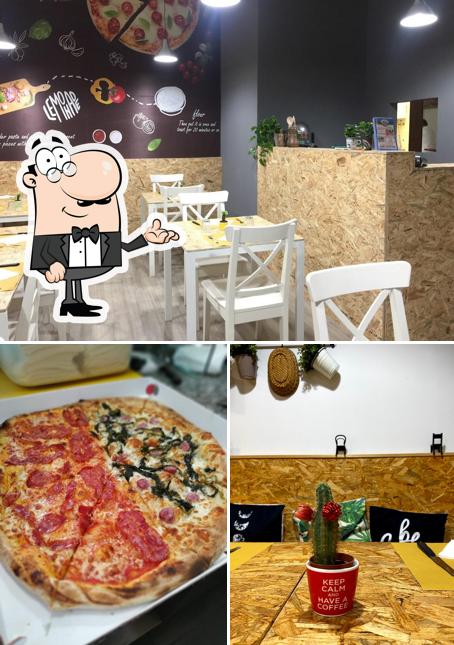 Tra le diverse cose da Pizza Gusto Italiano si possono trovare la interni e pizza