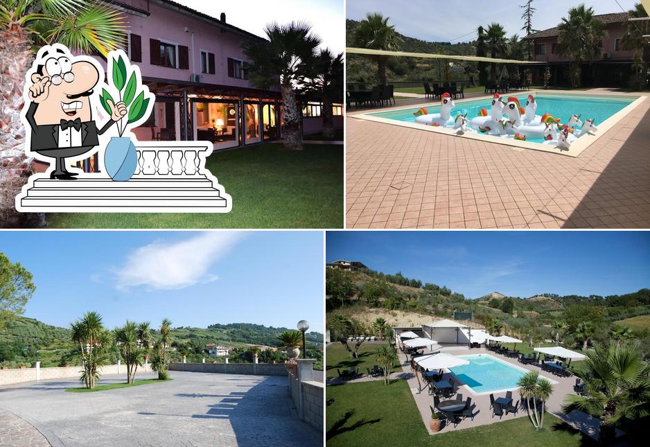 Puoi goderti l'aria fresca da seduto all'esterno di Queen Hotel