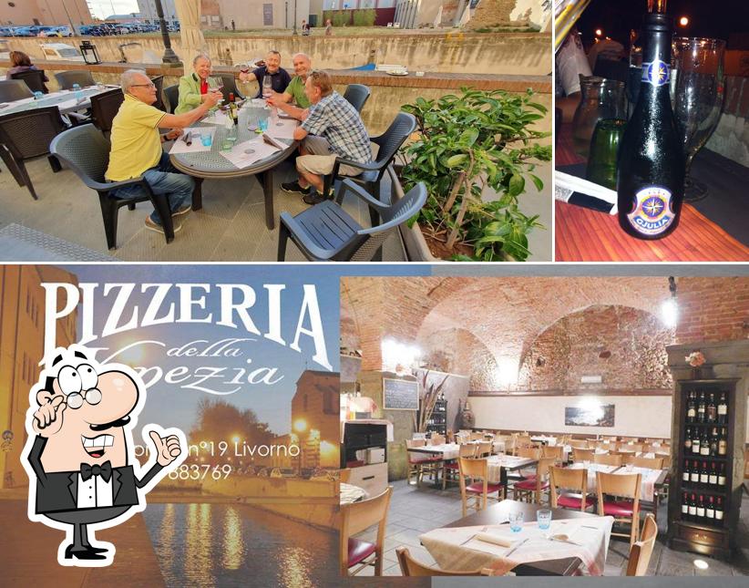 Guarda la immagine che raffigura la interni e birra di Pizzeria Della Venezia