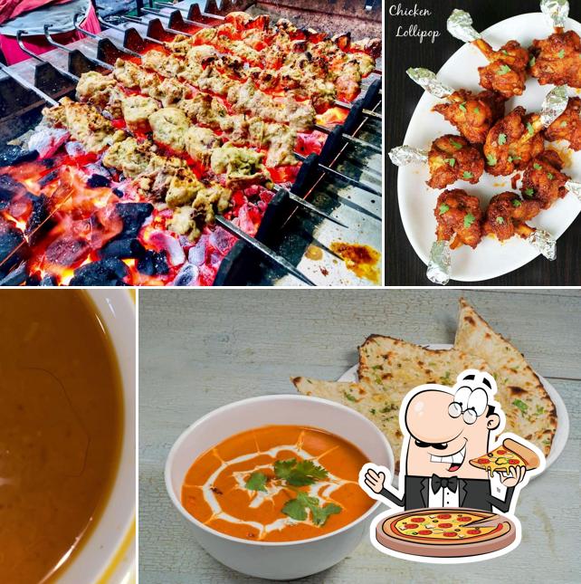 Try out pizza at AJMERI DARBAR