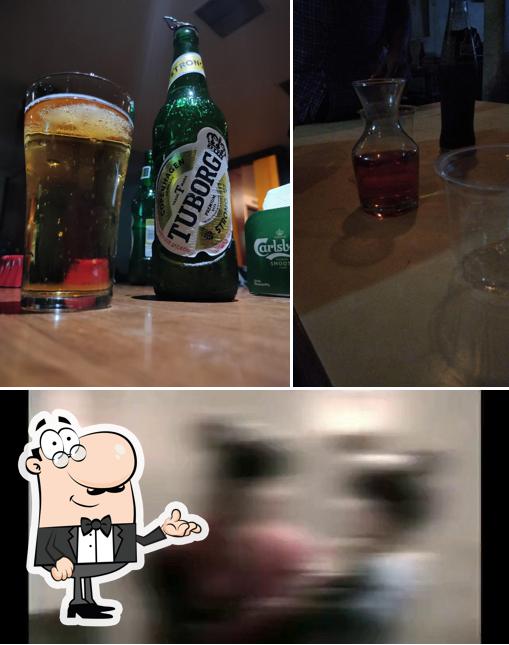 This is the photo showing interior and beer at Amruth Restaurant & Bar- best bar