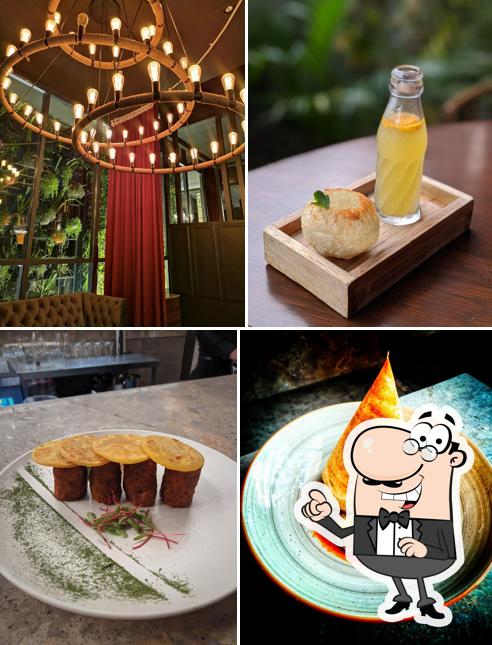 Take a seat at one of the tables at Raahi Neo Kitchen & Bar