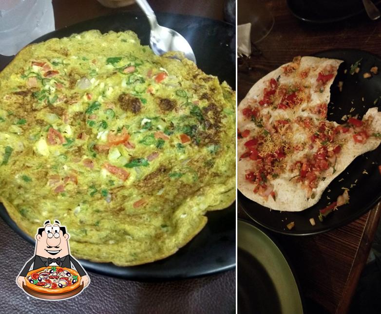 Try out pizza at Mahek Biryani House