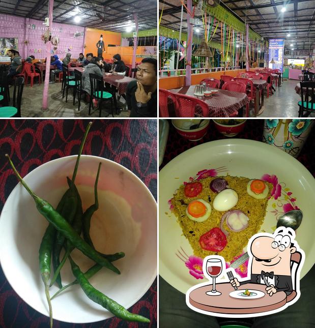 Among different things one can find food and interior at Joy Guru Hotel And Family Restaurant