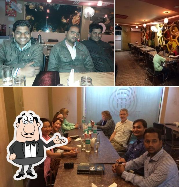 Take a seat at one of the tables at Masala Street