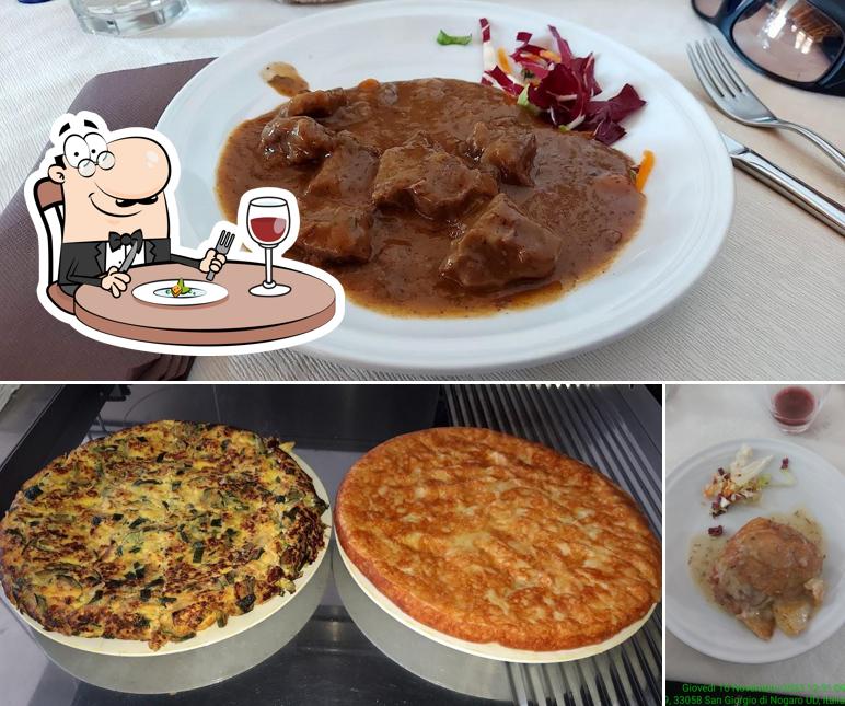 La foto della cibo e interni di Trattoria Aussa Corno