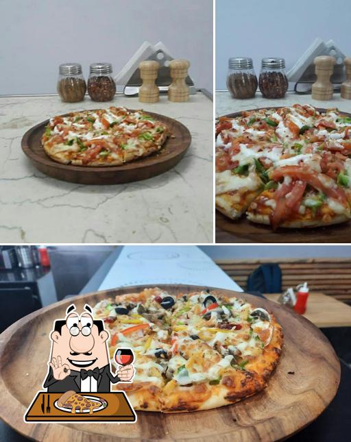 Get pizza at Cafe 4 Chef-Gumaniwala