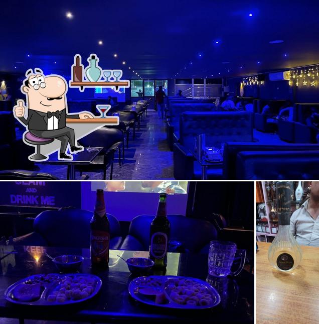 Take a seat at one of the tables at The Elite Shop Forign Liquors