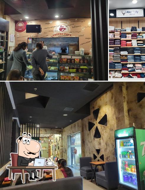 Take a look at the image displaying interior and food at SHOBHIKA COFFEE CAFE