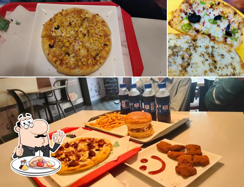 Try out pizza at The Chicken Company