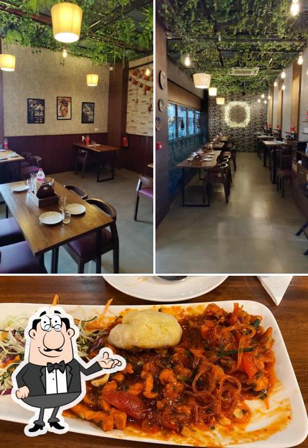 This is the photo depicting interior and food at Lama by Yeti Awarded Best Ethnic and Oriental Cuisine