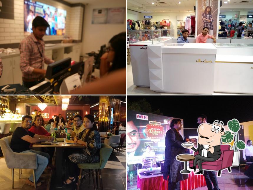 Take a seat at one of the tables at Ashok Cosmos Mall