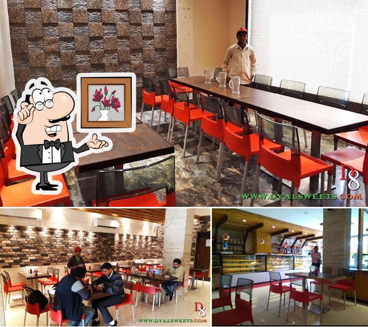 Take a seat at one of the tables at Dyal Sweets & Bakery