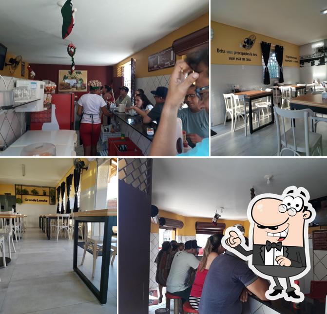 Sente em uma das mesas no Grande Lanche