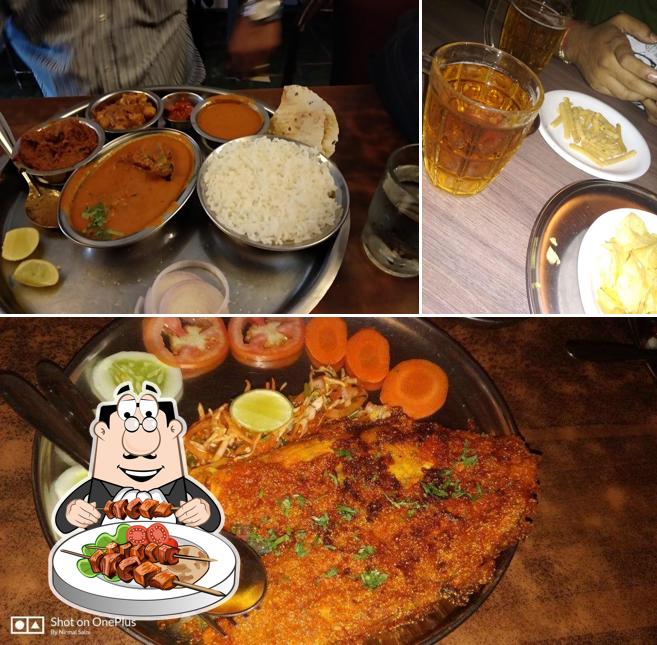 Among various things one can find food and beer at New Royal Lunch Home