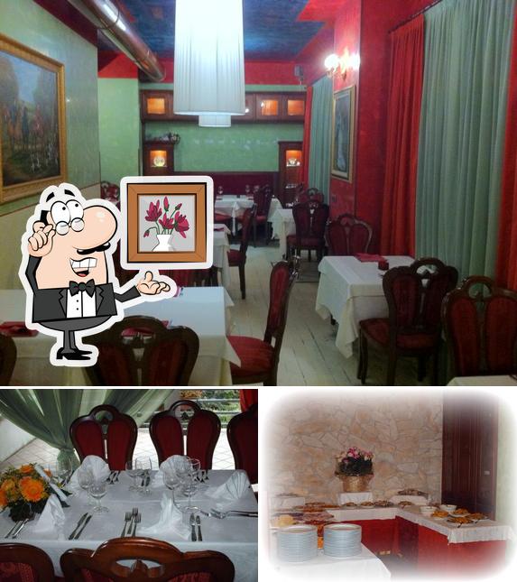 Questa è la immagine che mostra la interni e cibo di Da Nando e Tony