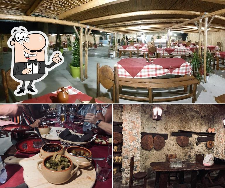 Siediti a un tavolo di Ristorante Le Grotte di Torre Galea