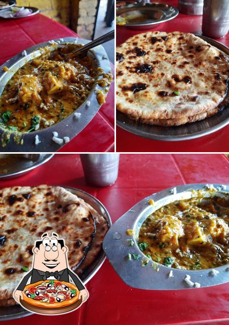 Try out pizza at Lala Da Dhaba