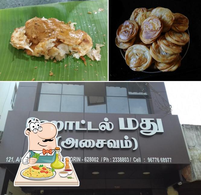 This is the photo showing food and exterior at Hotel Madhu
