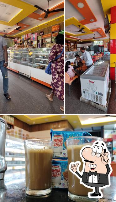 Take a look at the image showing interior and beverage at MDS BAKES