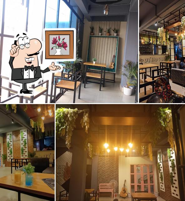 Take a seat at one of the tables at Pot House