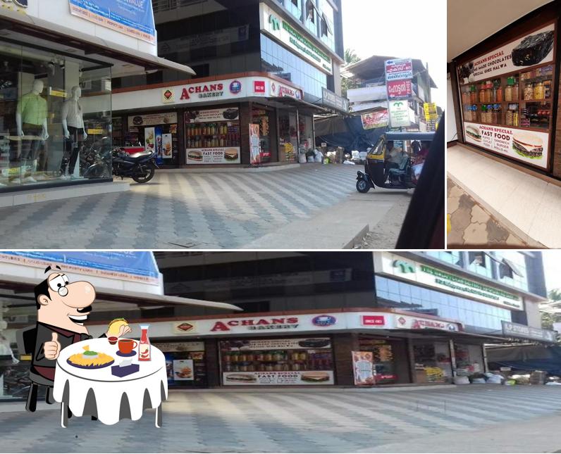Order a burger at Achans Bakery Cafe & Juice Shop