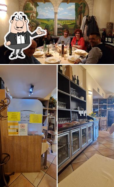 Siediti a un tavolo di Ristorante al Cortiletto
