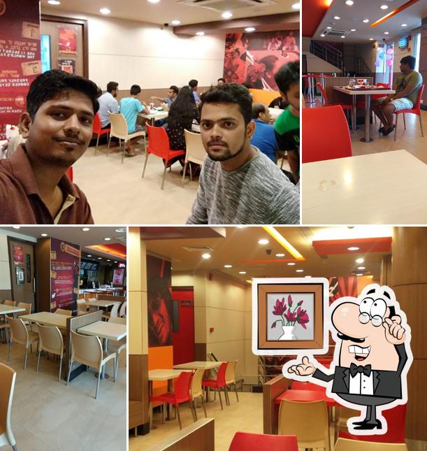 Take a seat at one of the tables at KFC