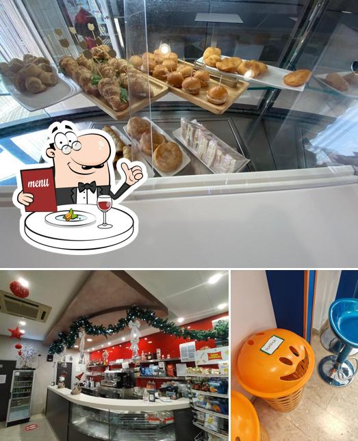 Dai un’occhiata alla foto che presenta la cibo e interni di Max Cafè
