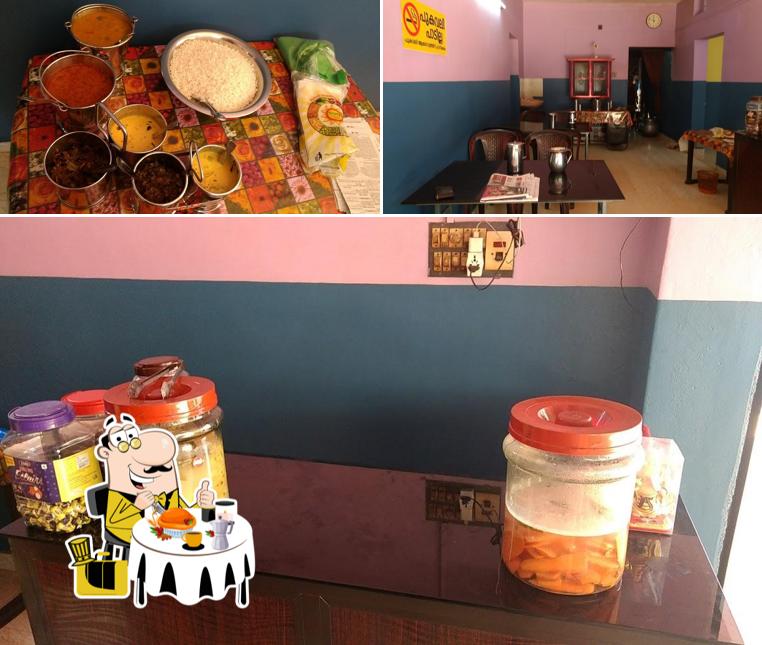 Check out the image displaying food and interior at Kudumbasree Hotel