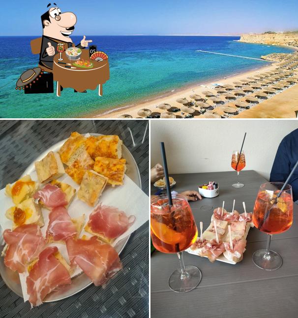Questa è la immagine che mostra la cibo e esterno di Deliziatevi e con gusto affezionatevi