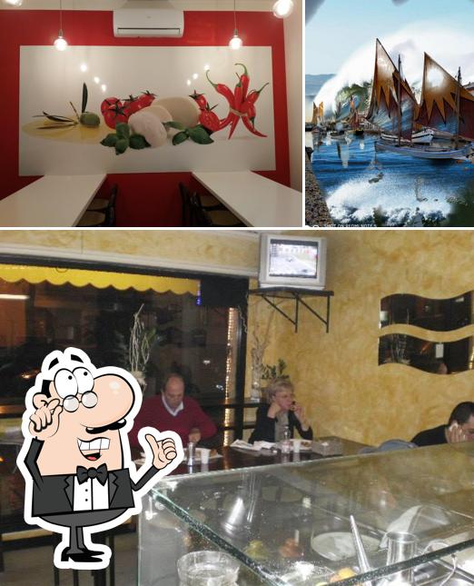 Tra le varie cose da Pizzeria Redipizza si possono trovare la interni e esterno