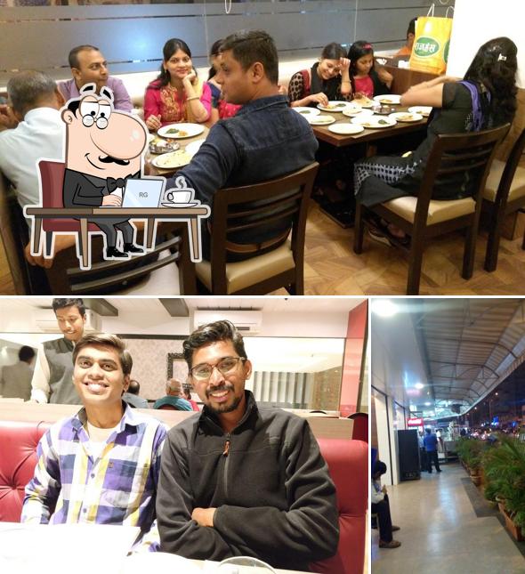 Take a seat at one of the tables at Prasadam