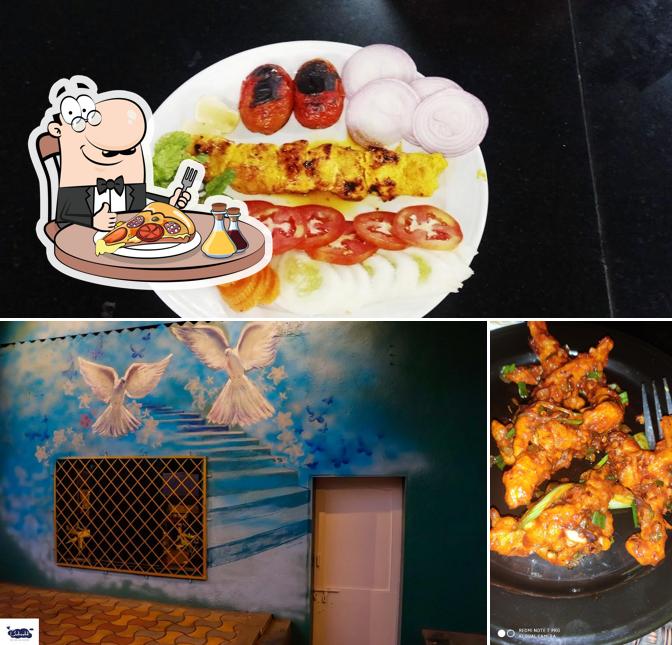 Pick pizza at Behesht Restaurant & Cafe