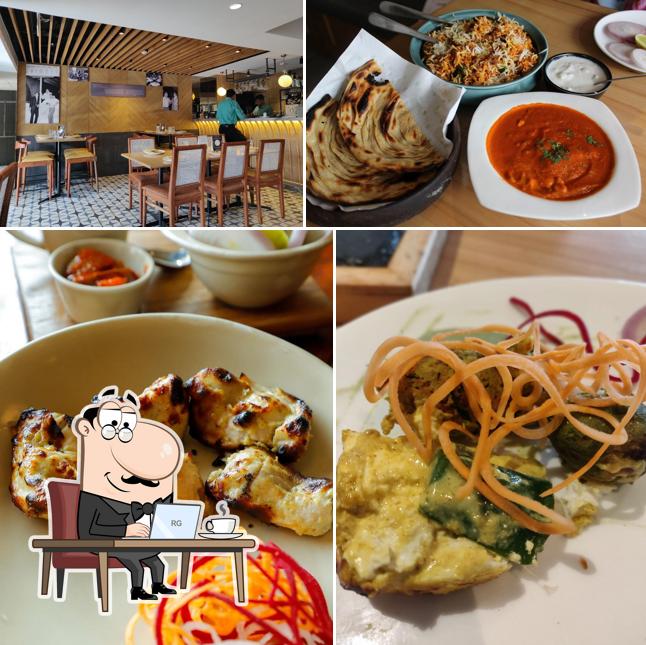 Take a seat at one of the tables at Copper Chimney - Bandra West, Mumbai (We have moved to another location)