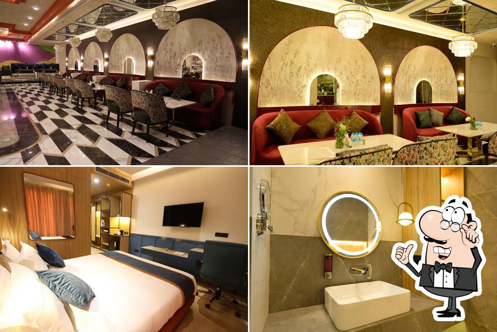 Take a seat at one of the tables at Hotel The Park Gate Mohali