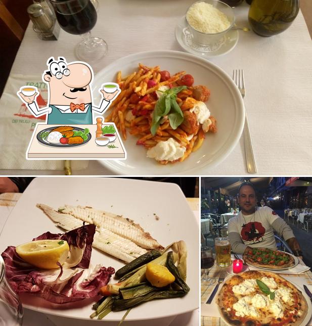 La foto di cibo e bancone da bar da Dei Trulli