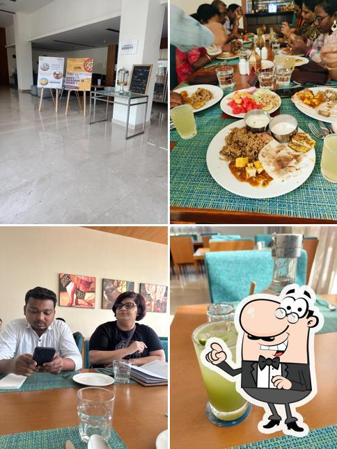 Take a seat at one of the tables at Kovai Kitchen