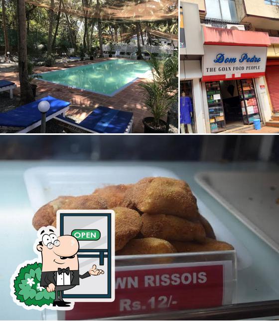 Take a look at the photo displaying exterior and food at Dom Pedro