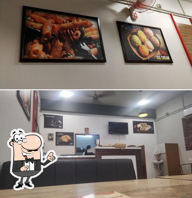 Check out how Pizza day Cafe Mayiladuthurai looks inside