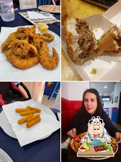 Prenditi i piatti di carne a Wings Chicken