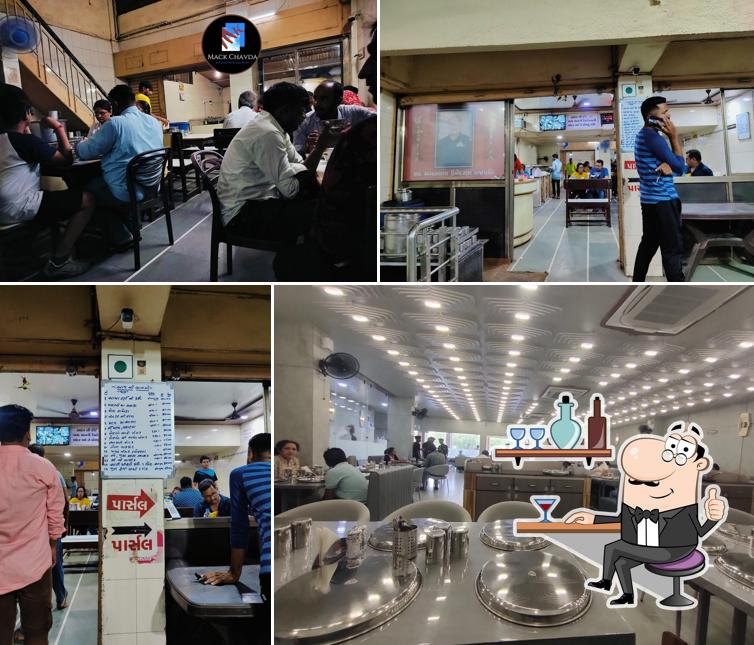 Take a seat at one of the tables at Maganlal Bhakhri Shak Wala, Gayatri Restaurant