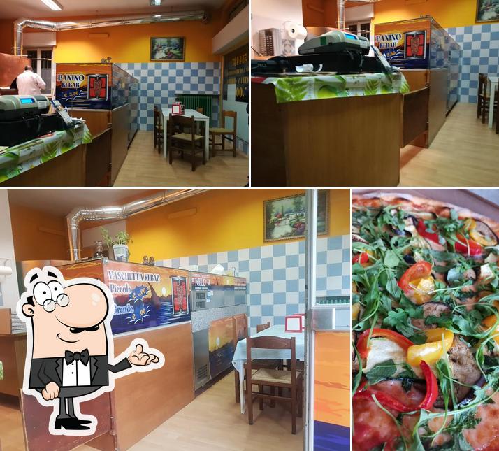 Pizzeria Nilo Di Abdelaziz Mousad Salah si caratterizza per la interni e cibo