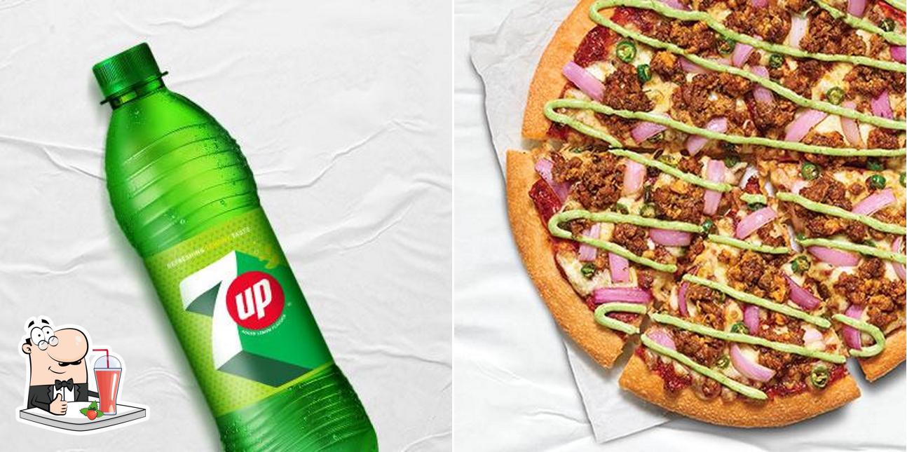 Enjoy a beverage at Pizza Hut Emrald Mall, Lucknow