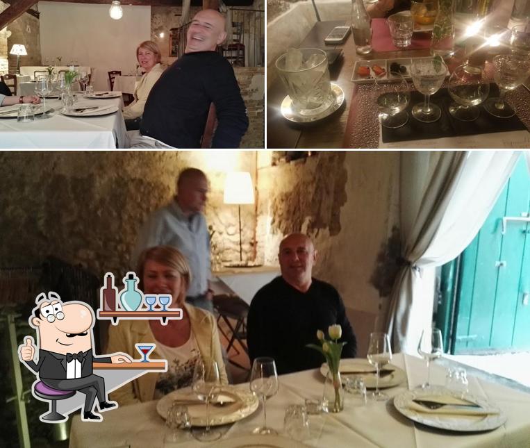 La immagine di interni e tavolo da pranzo da Tiee Cibo&Vino - Ristorantino e Cocktail Bar
