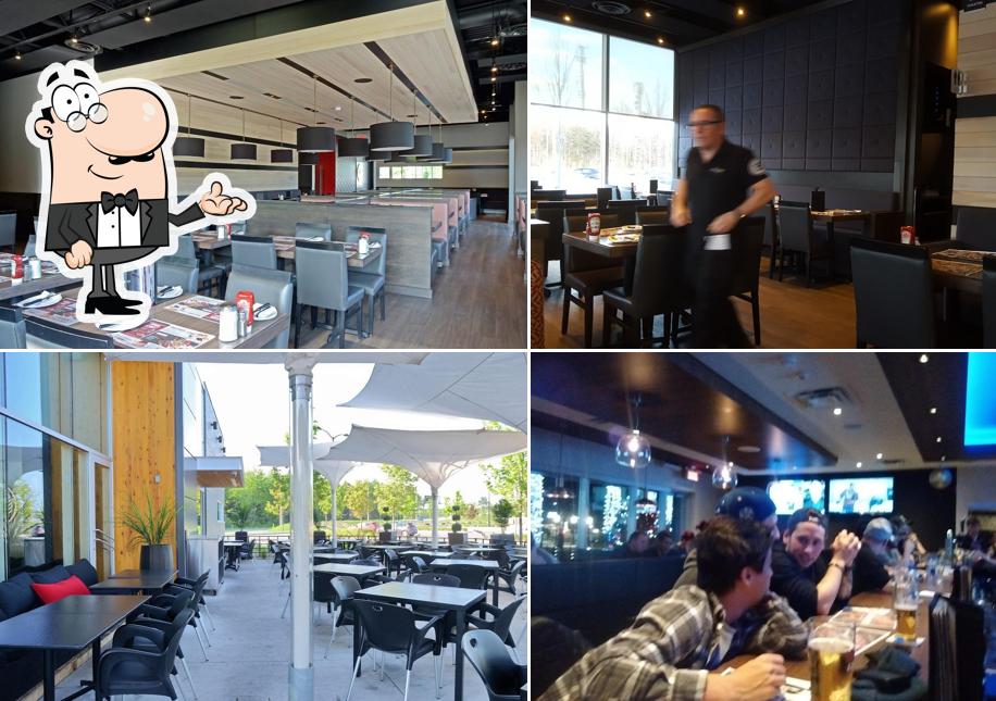 Installez-vous à l'une des tables de Barbies Resto Bar Grill