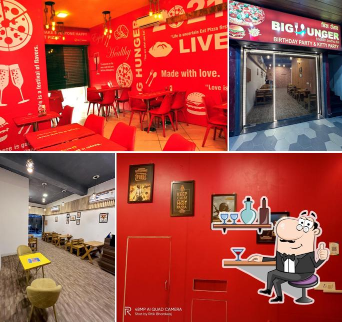 Take a seat at one of the tables at Big Hunger Pizza - Best Pizza Restaurant in Zirakpur