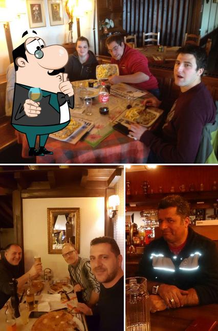 La foto di bancone da bar e interni da Motel Beauregard