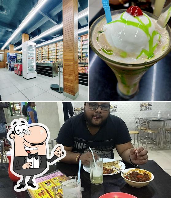 This is the photo displaying interior and beverage at CHICKEN CHICAGO`AND SUN BAKERS
