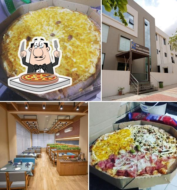 Pick pizza at Hotel The Grand Vinayak